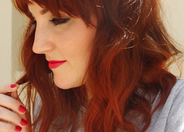 Red hair, lips and nails